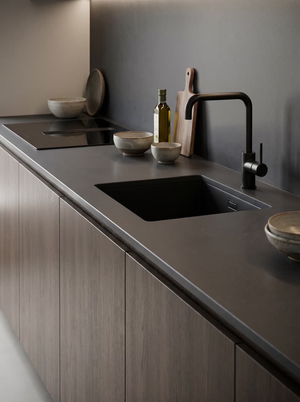 Encimera de cocina moderna con fregadero integrado, placa de cocción y frente renovado